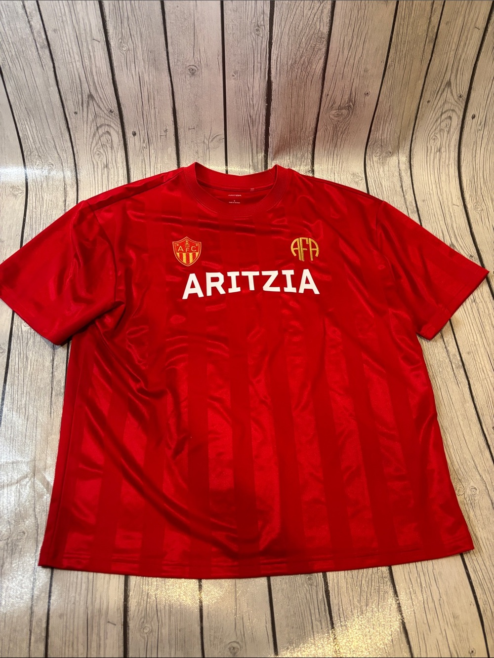 Aritzia women’s Red Touchline Jersey with Gold embroidery size small